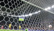 Jordan's midfielder #10 Musa al-Tamari celebrates after scoring his team's fourth goal during the Qatar 2023 AFC Asian Cup football match against Malaysia on January 15, 2024. (Photo by Hector Retamal / AFP)