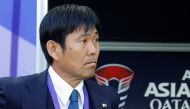 Japan's coach Hajime Moriyasu watches before the start of the Qatar 2023 AFC Asian Cup Group D football match between Japan and Vietnam at the Al-Thumama Stadium in Doha on January 14, 2024. (Photo by KARIM JAAFAR / AFP)
