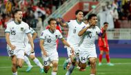 Indonesia's defender #14 Asnawi Mangkualam celebrates after scoring his team's first goal from the penalty spot during the Qatar 2023 AFC Asian Cup Group D football match between Vietnam and Indonesia at the Abdullah bin Khalifa Stadium in Doha on January 19, 2024. (Photo by Karim Jaafar / AFP)