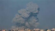 A picture taken from Rafah shows smoke billowing over Khan Yunis in the southern Gaza Strip during Israeli bombardment on January 19, 2024. (Photo by AFP)