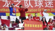 Image of China football team fans ahead of their match at Khalifa International Stadium. Pic by Rajan Vadakkemuriyil / The Peninsula 