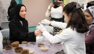 Minister of Education and Higher Education H E Buthaina bint Ali Al Jabr Al Nuaimi attending an event held at a school to mark International Day of Education. 