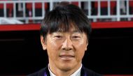 Indonesia's South Korean coach Shin Tae-yong watches the Qatar 2023 AFC Asian Cup Group D football match between Vietnam and Indonesia at the Abdullah bin Khalifa Stadium in Doha on January 19, 2024. (Photo by KARIM JAAFAR / AFP)
