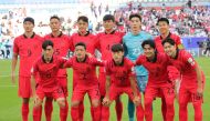 South Korea's starting eleven (top L to R) forward #09 Cho Gue-sung, defender #15 Jung Seung-hyun, midfielder #05 Park Yong-woo, defender #04 Kim Min-jae, goalkeeper #21 Jo Hyeon-woo, midfielder #07 Son Heung-min; (bottom L to R) midfielder #06 Hwang In-beom, defender #02 Lee Ki-je, midfielder #10 Lee Jae-sung, defender #22 Seol Young-woo and midfielder #18 Lee Kang-in pose for the group picture before the start of the Qatar 2023 AFC Asian Cup Group E football match between Jordan and South Korea at the Al-Thumama Stadium in Doha on January 20, 2024. (Photo by Giuseppe CACACE / AFP)
