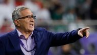 Oman's Croatian coach Branko Ivankovic speaks to his players during the Qatar 2023 AFC Asian Cup Group F football match between Saudi Arabia and Oman at the Khalifa International Stadium in Doha on January 16, 2024. (Photo by KARIM JAAFAR / AFP)
