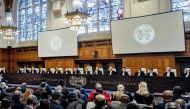 ICJ President Joan Donoghue (centre) speaks at the International Court of Justice (ICJ) prior to the verdict announcement in the genocide case against Israel, brought by South Africa, in The Hague on January 26, 2024. (Photo by Remko de Waal / ANP / AFP) 