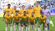 (Top L to R) Australia's forward #10 Kusini Yengi, Australia's defender #03 Nathaniel Atkinson, Australia's defender #04 Kye Rowles, Australia's midfielder #22 Jackson Irvine, Australia's defender #19 Harry Souttar, Australia's goalkeeper #01 Mathew Ryan, (bottom L to R) Australia's midfielder #14 Riley McGree, Australia's defender #05 Jordan Bos, Australia's midfielder #17 Keanu Baccus, Australia's forward #06 Martin Boyle and Australia's defender #16 Aziz Behich pose for a team picture during the Qatar 2023 AFC Asian Cup Group B football match between Australia and Uzbekistan at the Al-Janoub Stadium in Al-Wakrah, south of Doha on January 23, 2024. (Photo by HECTOR RETAMAL / AFP)