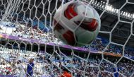 Thailand's goalkeeper #23 Patiwat Khammai concedes the first goal during the Qatar 2023 AFC Asian Cup football match between Uzbekistan and Thailand at Al-Janoub Stadium on January 30, 2024. Photo by KARIM JAAFAR / AFP