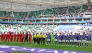 Players arrive on the pitch for the Qatar 2023 AFC Asian Cup football match between Bahrain and Japan at al-Thumama Stadium in Doha on January 31, 2024. Photo by Giuseppe Cacace / AFP)