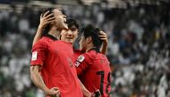 South Korea’s Cho Gue-sung (left) celebrates after scoring his team’s first goal against Saudi Arabia on Tuesday. AFP