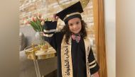 Hind Hamada, 6, celebrates her kindergarten graduation. Ihab Hamada