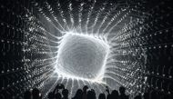 Visitors watch a light display during a tour of the new location for the digital art of Japanese collective 