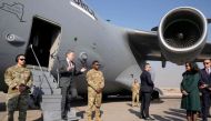 US Secretary of State Antony Blinken is welcomed by the Second Secretary for Egypt's Ministry of Foreign Affairs protocol Sarah Henry (R) upon arrival at Cairo East Airport in Cairo on February 6, 2024. (Photo by Mark Schiefelbein / POOL / AFP)
