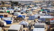 Picture taken on January 30, 2024, shows view of tents in a make-shift shelter for Palestinians who fled to Rafah in the southern Gaza Strip. (Photo by Mahmud Hams / AFP)