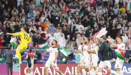 Jordan’s players celebrate after defeating South Korea in the semi-final.