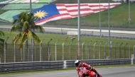 Ducati Italian rider Francesco Bagnaia steers his bike during the third day of the pre-season MotoGP test at the Sepang International Circuit in Sepang on February 8, 2024. (Photo by Mohd RASFAN / AFP)