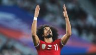 Akram Afif celebrates during the semi-final against Iran. 