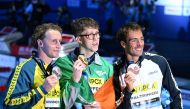 FROM LEFT: Australia’s silver-medallist Elijah Winnington, Ireland’s gold-medallist Daniel Wiffen and Italy’s bronze-medallist Gregorio Paltrinieri pose for a picture on the podium of the men’s 800m freestyle swimming event yesterday. PIC: AFP