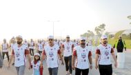 Participants at the Rawabi mini marathon organised to mark National Sport Day.