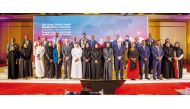 Minister of Public Health H E Dr. Hanan Al Kuwari (eight right); Minister of State for International Cooperation at the Ministry of Foreign Affairs H E Lolwah bint Rashid Al Khater (seventh right),  and several other dignitaries during the launch of Doha Global South Health Policy Initiative, yesterday. 