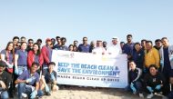  Landmark Group Qatar employees during a clean drive at Wakrah Family Beach.