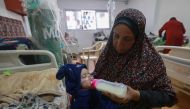 Palestinian children suffering from malnutrition receive treatment at a healthcare center in Rafah in the southern gaza Strip on March 5, 2024 (Photo by MOHAMMED ABED / AFP)