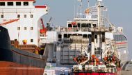 The Open Arms vessel (C) pictured in the Cypriot port of Larnaca on March 11, 2024. (Photo by Iakovos Hatzistavrou / AFP)