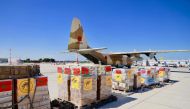 This handout picture taken on March 11, 2024 by the Maghreb Arabe Presse shows humanitarian aid shipped from Morocco to the people in gaza being handled at the Israeli Ben Guiron Airport in Tel Aviv. (Photo by Maghreb Arabe Presse / AFP) 