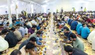 People break their fast during one of Education City's community Iftar.