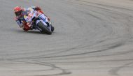 Ducati Spanish rider Marc Marquez takes part in the MotoGP first free practice session of the Portuguese Grand Prix at the Algarve International Circuit in Portimao on March 22, 2024. (Photo by Patricia Atricia De Melo Moreira / AFP)