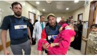 WHO and UN evacuate a 12-year-old child from Kamal Adwan hospital in northern Gaza on march 28, 2024.  
