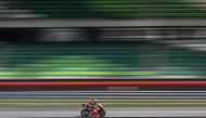 Red Bull KTM Factory Racing Jack Miller steers his bike during the second day of the pre-season MotoGP test at the Sepang International Circuit in Sepang on February 7, 2024. Photo by Mohd RASFAN / AFP