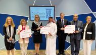 President of UDST Dr. Salem Al Naemi (centre) with Accreditation Canada CEO, Lauralee Thompson and other officials at the event.