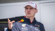 Red Bull Racing's driver Max Verstappen gestures in the paddock ahead of the Formula One Japanese Grand Prix at the Suzuka circuit in Suzuka, Mie prefecture on April 4, 2024. (Photo by Yuichi Yamazaki / AFP)