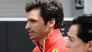 Ferrari's Spanish driver Carlos Sainz Jr walks to attend a press conference for the April 7 Formula One Japanese Grand Prix race at the Suzuka circuit in Suzuka, Mie prefecture on April 4, 2024. (Photo by Toshifumi KITAMURA / AFP)