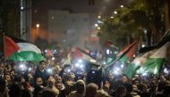 Moroccan protesters take part in a demonstration in solidarity with Palestinians following Al-Quds (Jerusalem) Day, a commemoration in support of Palestinian people on the last Friday of the holy month of Ramadan, in the city of Casablanca early on April 6, 2024. (Photo by FADEL SENNA / AFP)
