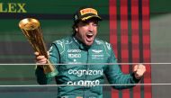 Third place Aston Martin's Spanish driver Fernando Alonso celebrates on the podium after the Formula One Brazil Grand Prix at the Autodromo Jose Carlos Pace racetrack, also known as Interlagos, in Sao Paulo, Brazil, on November 5, 2023. Photo by NELSON ALMEIDA / AFP