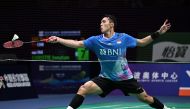 Indonesia's Jonatan Christie hits a return to China's Shi Yuqi during their men's singles semi-final match at the Badminton Asia Championships in Ningbo, in eastern China's Zhejiang province on April 13, 2024. (Photo by AFP)