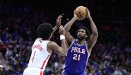 Joel Embiid #21 of the Philadelphia 76ers shoots over Amen Thompson #1 of the Houston Rockets during the fourth quarter at the Wells Fargo Center on January 15, 2024 in Philadelphia, Pennsylvania. Tim Nwachukwu/Getty Images/AFP

