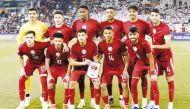 Qatar U23 players pose ahead of the opening match against Indonesia. 