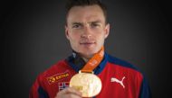 (Files) Men's 400m hurdles gold medalist, Norway's Karsten Warholm poses for portraits during a studio photo session on the sidelines of the World Athletics Championships at the National Athletics Centre in Budapest on August 24, 2023. (Photo by Andrej Isakovic / AFP)