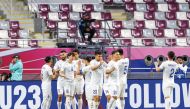 Uzbekistan's players celebrate their goal yesterday. QNA