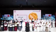 Assistant Undersecretary for Educational Affairs at MoEHE Maha Zaid Al Ruwaili (front, centre) with winners of second fitness and health project in a ceremony yesterday.