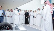 Minister of Transport H E Jassim Saif Ahmed Al Sulaiti, Minister of Education and Higher Education H E Buthaina bint Ali Al Jabr Al Nuaimi, Minister of Municipality H E Abdullah bin Hamad bin Abdullah Al Attiyah, and other officials touring an exhibition at Autonomous e-Mobility Forum at QNCC yesterday.