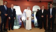 Julius Baer CEO in Qatar, Slim Bouker (second left); Head of Middle East & Africa at Julius Baer, Regis Berger (first left); Qatari artist Aisha Al Abdulla (centre) along with other officials during the event.