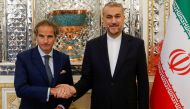 Iranian foreign minister Hossein Amir Abdoulahian (R) meets with UN atomic watchdog chief Rafael Grossi in Tehran, Iran, 06 May 2024. Photo by AFP.