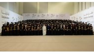 Her Highness Consort of HH The Amir Sheikha Jawaher bint Hamad bin Suhaim Al Thani and QU President Dr. Omar Al-Ansari in a group photo with the distinguished female Class of 2024 graduates.