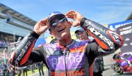 Race winner Prima Pramac Racing's Spanish rider Jorge Martin celebrates after the French MotoGP Grand Prix sprint race at the Bugatti circuit in Le Mans, northwestern France, on May 11, 2024. (Photo by Lou Benoist / AFP) 