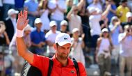 Serbia's Novak Djokovic waves to fans as he leaves the court after being defeated by Chile's Alejandro Tabilo at the Men's ATP Rome Open tennis tournament at Foro Italico in Rome on May 12, 2024. (Photo by Tiziana FABI / AFP)