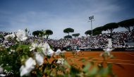 Russia's Andrey Rublev returns to France's Alexandre Muller during the Men's ATP Rome Open tennis tournament at Foro Italico in Rome on May 13, 2024. (Photo by Filippo MONTEFORTE / AFP)